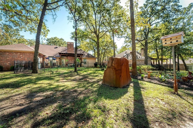 view of yard with fence