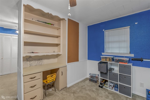 office area with ceiling fan, ornamental molding, and carpet flooring