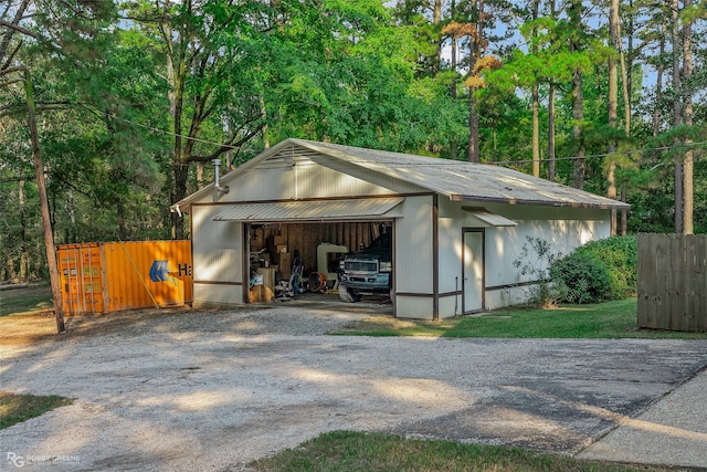 view of outbuilding with a garage