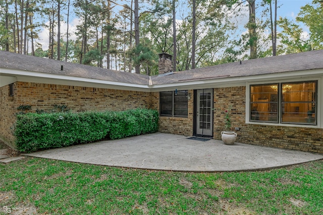 rear view of property with a patio area