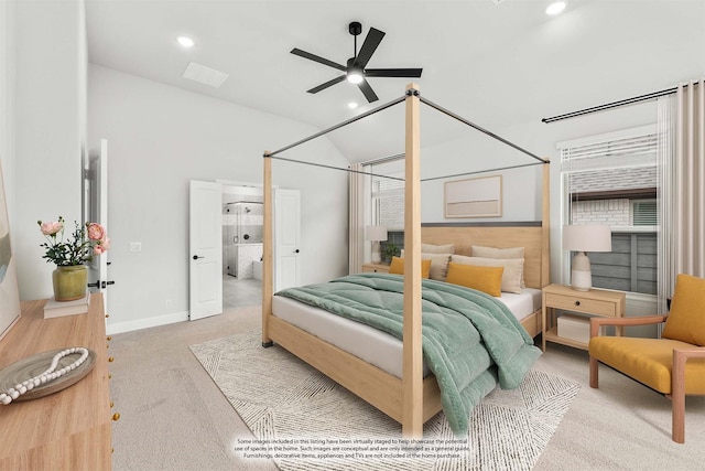 bedroom with vaulted ceiling and carpet flooring