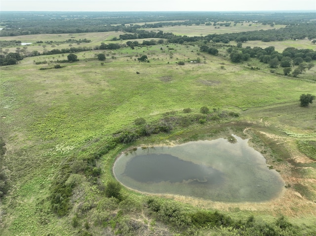 aerial view with a water view and a rural view