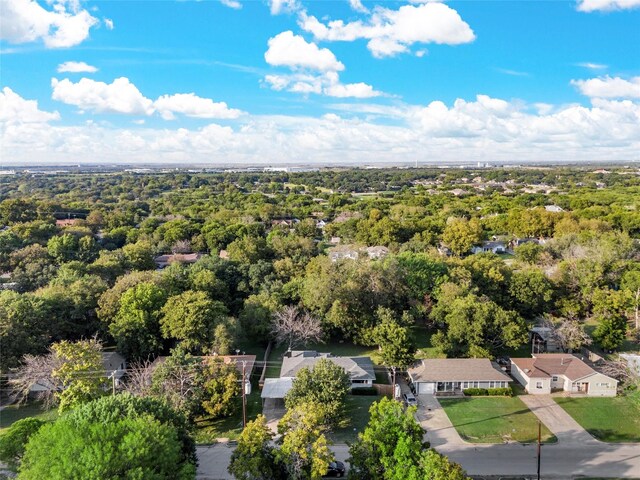 drone / aerial view with a view of trees