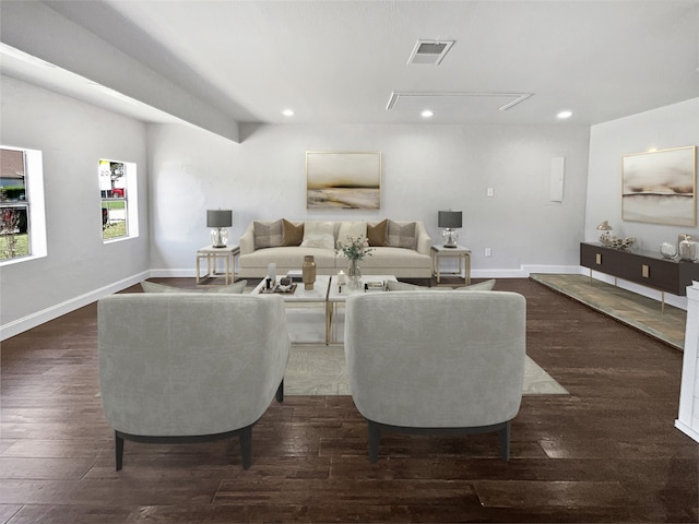 living room with dark hardwood / wood-style floors