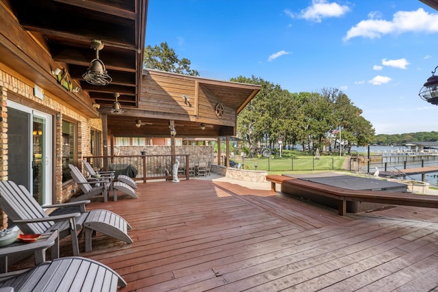 wooden deck with a water view