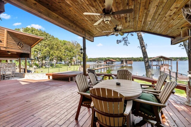 view of front of home featuring an outdoor living space with a fire pit, a balcony, a front yard, and a patio area