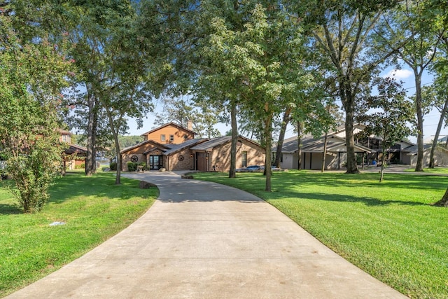 mid-century modern home featuring a residential view, a chimney, and a front lawn