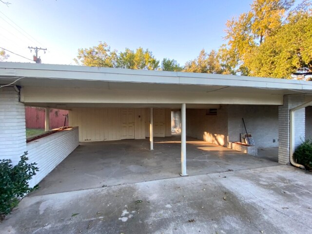 4837 S Ridge Ter, Fort Worth, TX 76133 - view of parking with concrete driveway and a carport