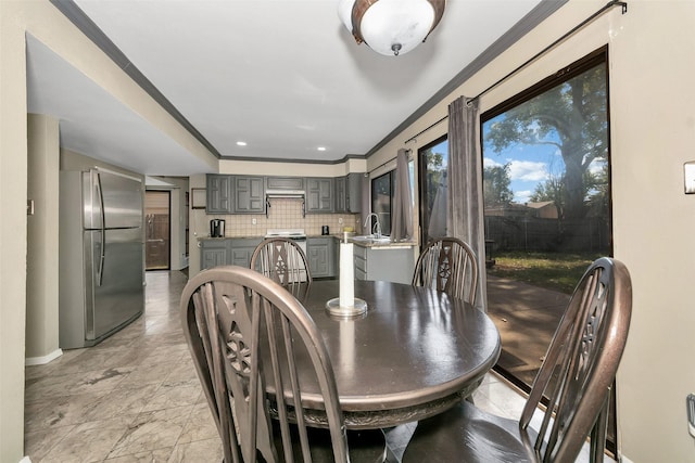 dining space with sink