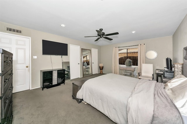 carpeted bedroom with visible vents, a ceiling fan, and recessed lighting