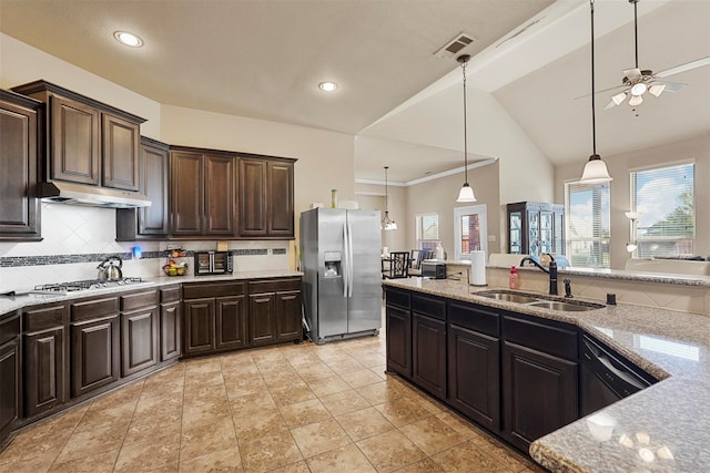 kitchen with sink, appliances with stainless steel finishes, and dark brown cabinets