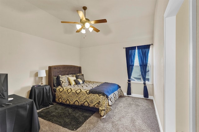 bedroom featuring ceiling fan, carpet flooring, and lofted ceiling