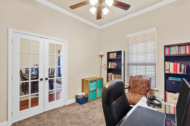 office with french doors, crown molding, carpet flooring, and ceiling fan