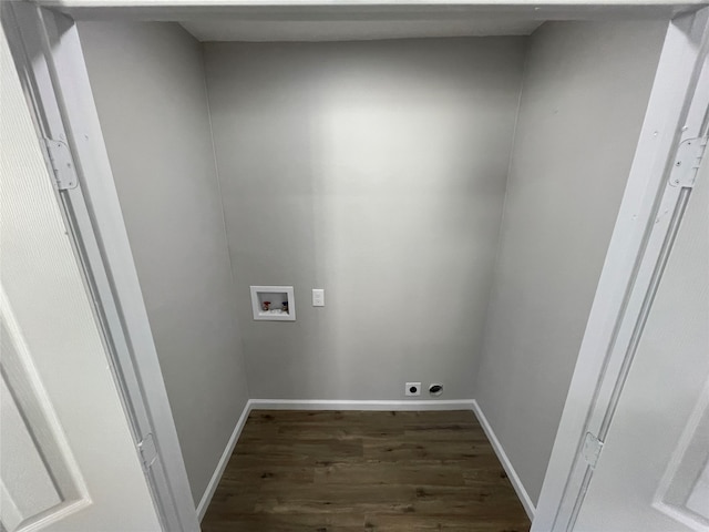 laundry area with electric dryer hookup, hookup for a washing machine, and dark wood-type flooring