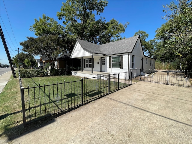 view of front of home with a front lawn