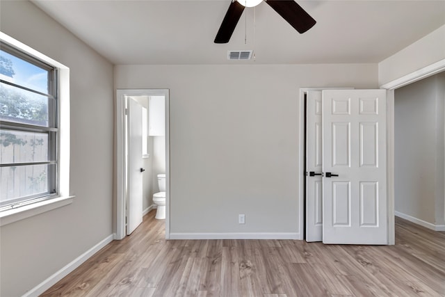 unfurnished bedroom with ceiling fan, a closet, and light hardwood / wood-style flooring