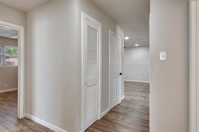 hallway featuring light wood-type flooring