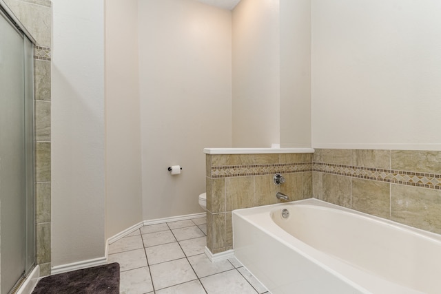 bathroom with independent shower and bath, tile patterned floors, and toilet