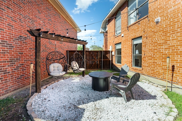 view of yard with a patio and an outdoor fire pit