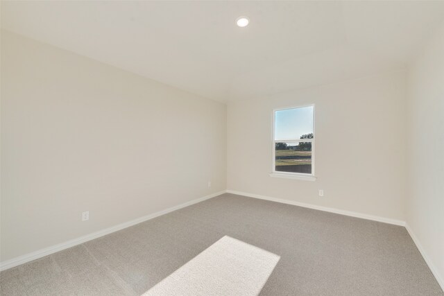 unfurnished room with carpet