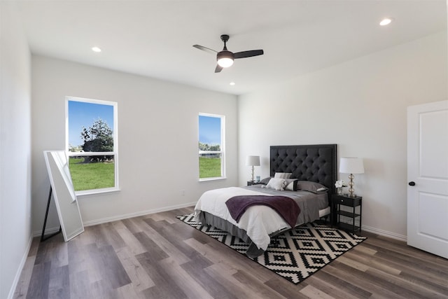 bedroom featuring ceiling fan and wood-type flooring