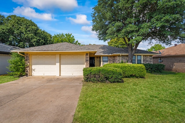 ranch-style home with a front yard and a garage