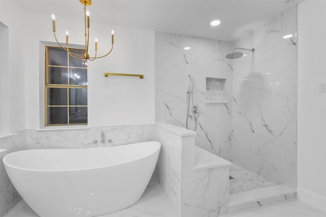 bathroom with plus walk in shower, a chandelier, and tile walls