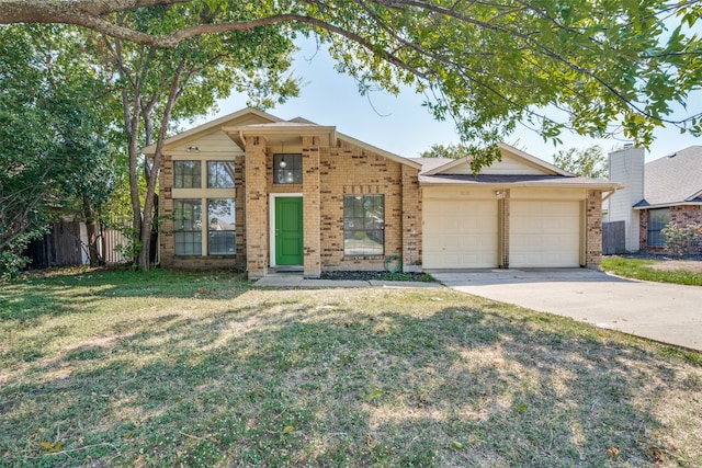 ranch-style home with a garage and a front lawn