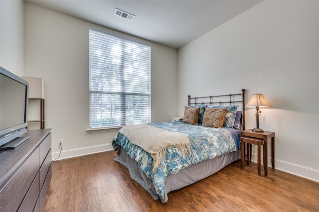 bedroom featuring wood-type flooring