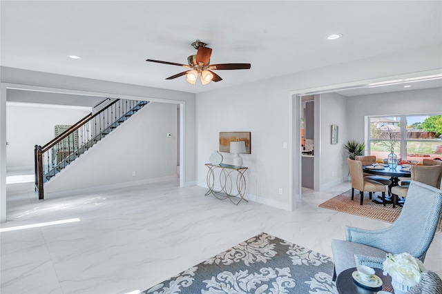 living room with ceiling fan