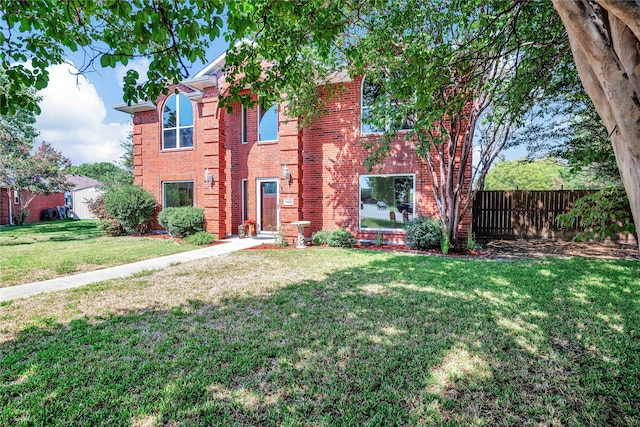 view of front of home featuring a front yard