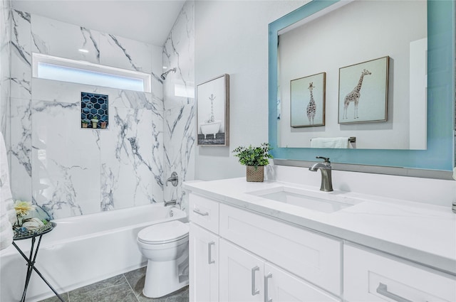 full bathroom with vanity, toilet, and tiled shower / bath