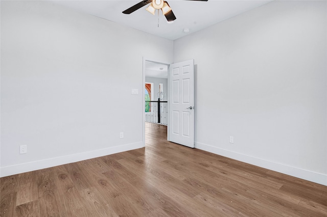 unfurnished room with light hardwood / wood-style flooring and ceiling fan