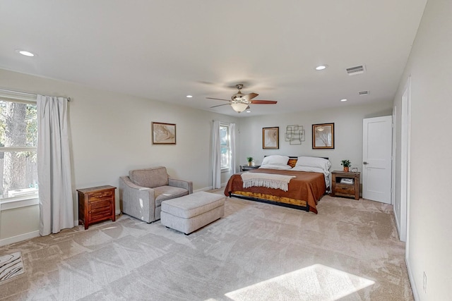 carpeted bedroom featuring ceiling fan