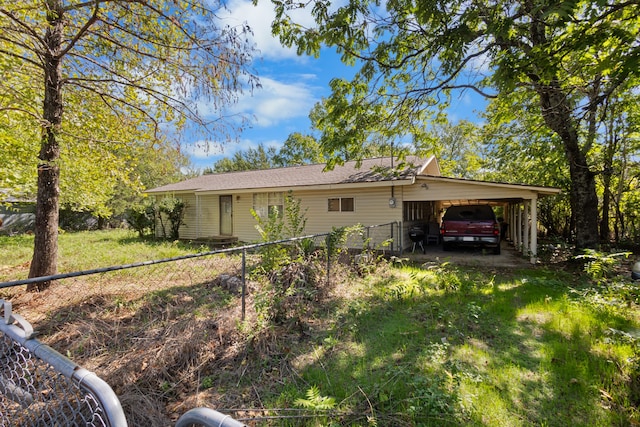 view of property exterior featuring a carport