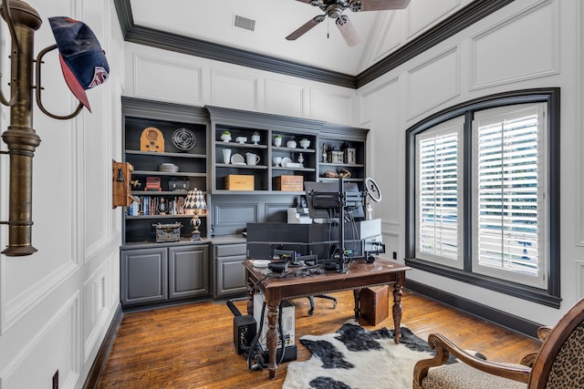 office with ceiling fan, crown molding, vaulted ceiling, and dark hardwood / wood-style flooring