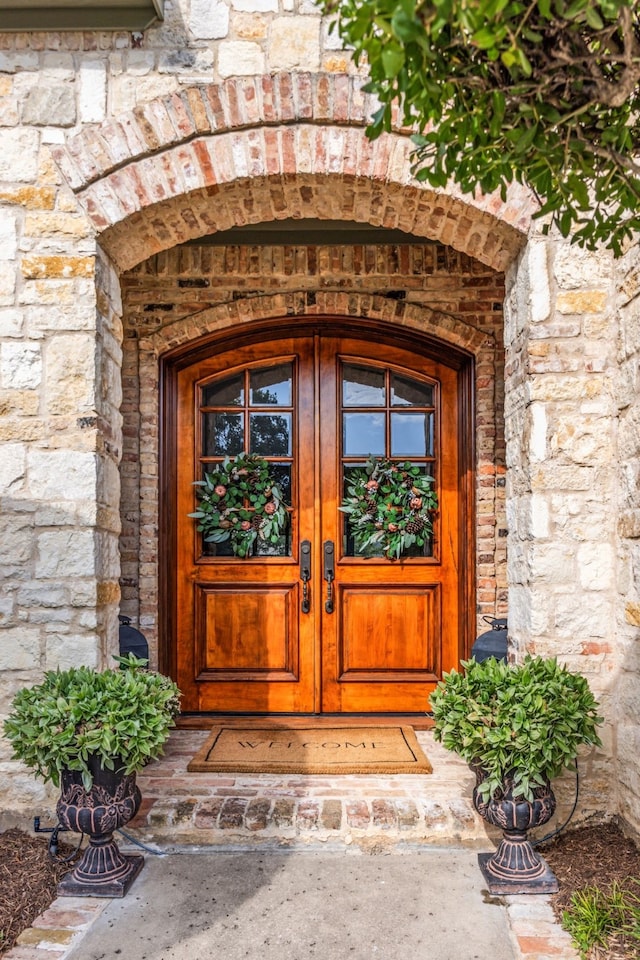 doorway to property featuring french doors