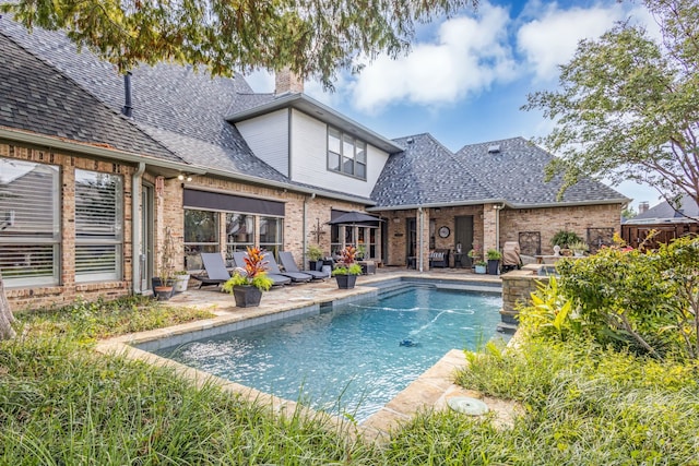 view of swimming pool featuring a patio area