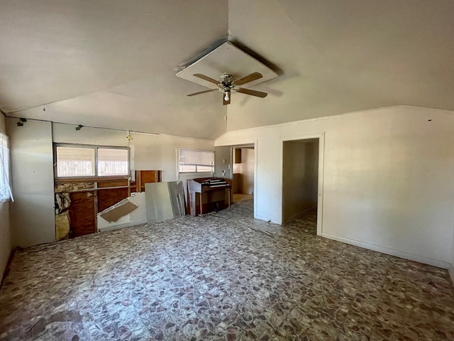 unfurnished living room with lofted ceiling and ceiling fan