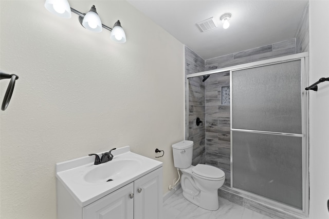 bathroom with walk in shower, vanity, and toilet