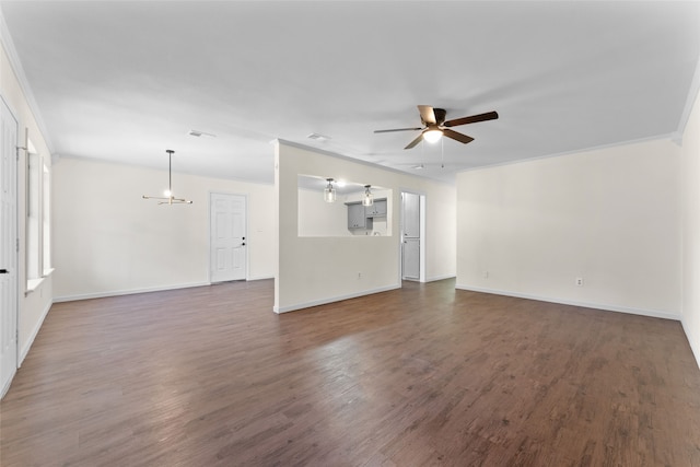 unfurnished living room with ornamental molding, dark wood-type flooring, and ceiling fan