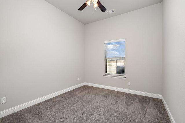 spare room with ceiling fan and carpet floors