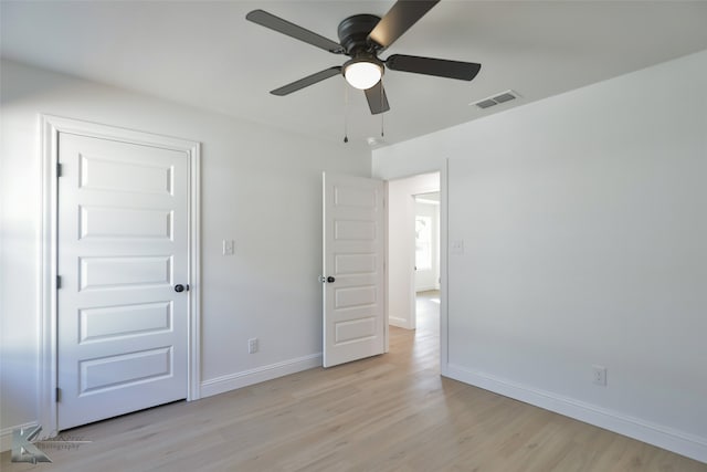 unfurnished bedroom with light hardwood / wood-style floors and ceiling fan