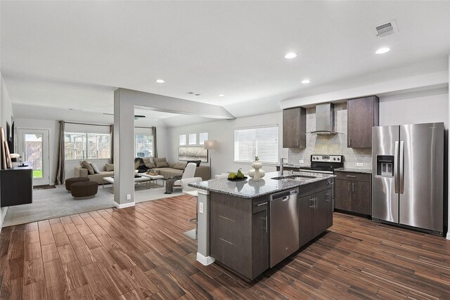 living room featuring light hardwood / wood-style flooring, ceiling fan, and lofted ceiling