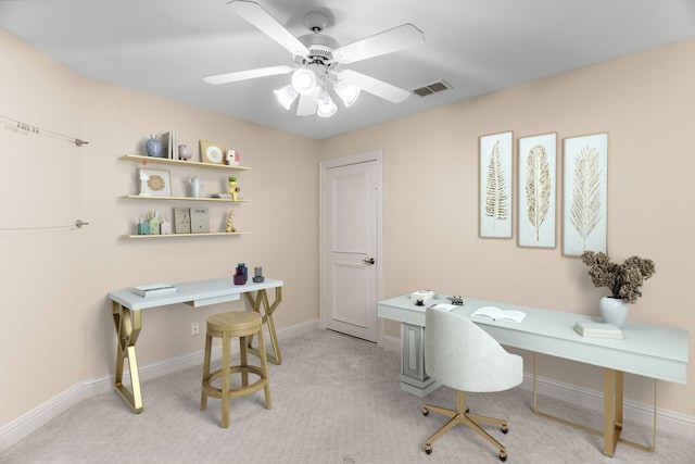 office area with ceiling fan and light colored carpet