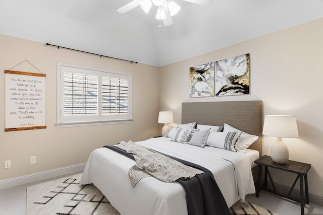 bedroom featuring light colored carpet and ceiling fan