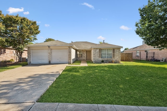 ranch-style house with a garage and a front lawn