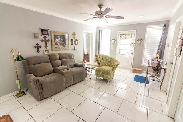 living room with ornamental molding and ceiling fan