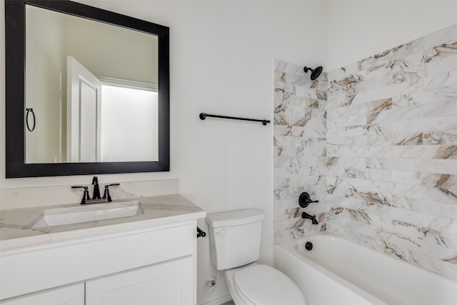 full bathroom featuring vanity, toilet, and tiled shower / bath combo