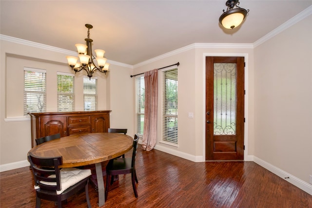 dining room with plenty of natural light, dark hardwood / wood-style floors, and ornamental molding